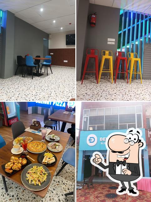 The interior of Delight Pizza