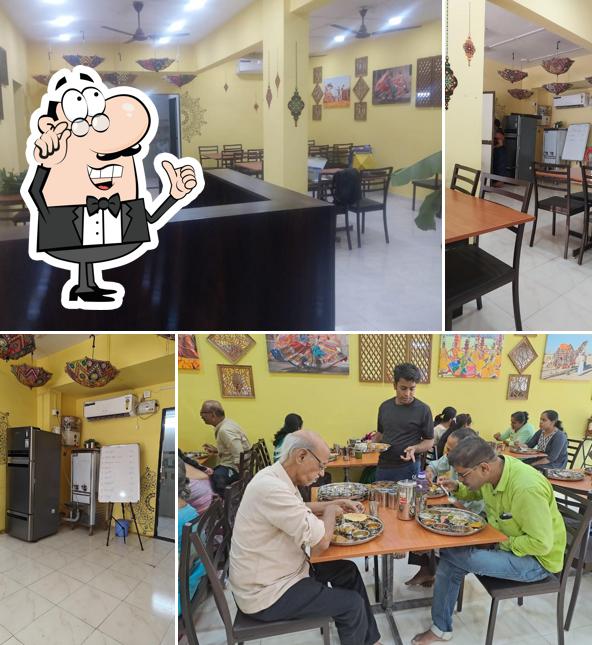 Check out how TULSI DINING HALL PURE VEG CHIPLUN looks inside
