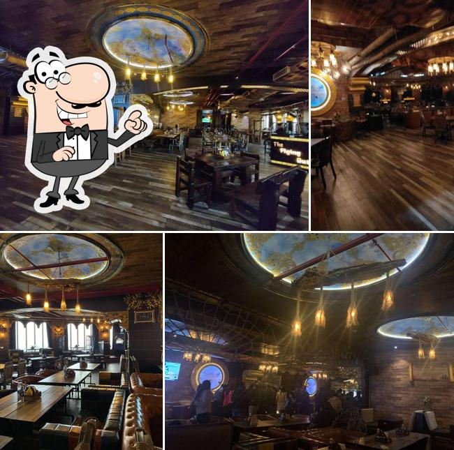 Take a seat at one of the tables at The Flying Dutchman , 5th Floor, Bhutani City Center Mall Noida Sector-32