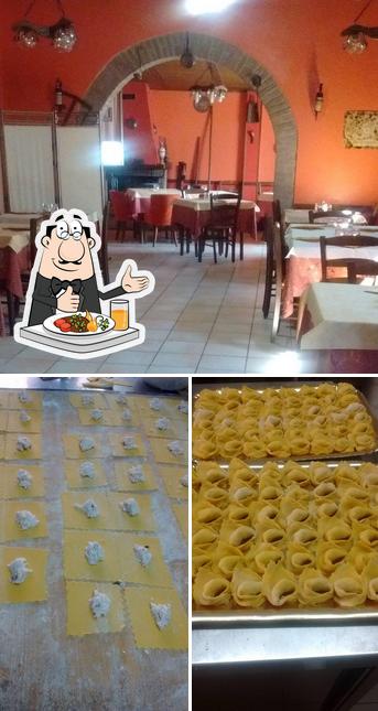 Tra le diverse cose da Trattoria Lago Corallo si possono trovare la cibo e interni