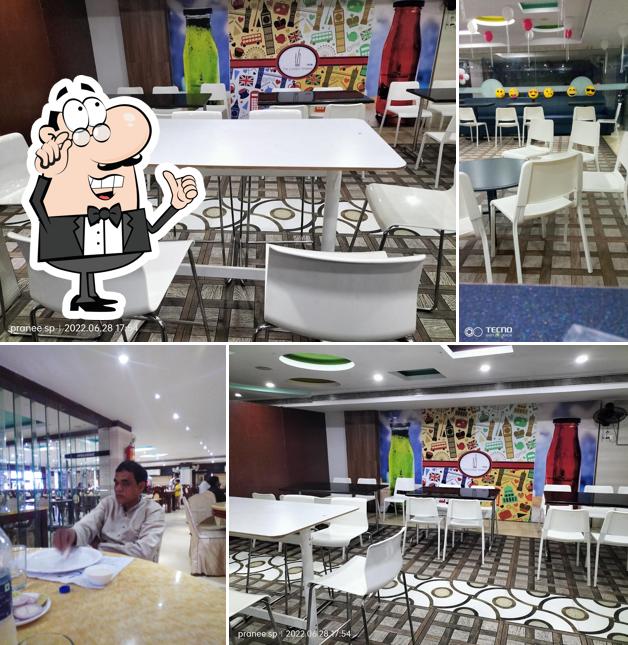 Take a seat at one of the tables at SVA Hotel Grand