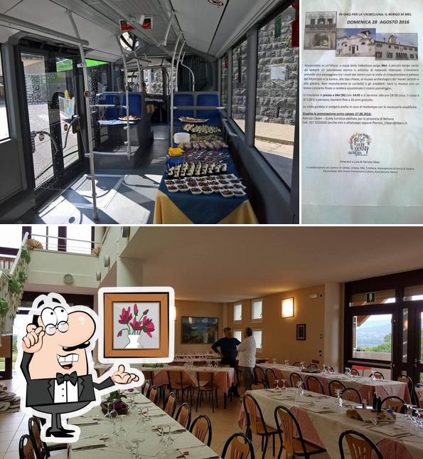 Siediti a un tavolo di Trattoria L'Oasi