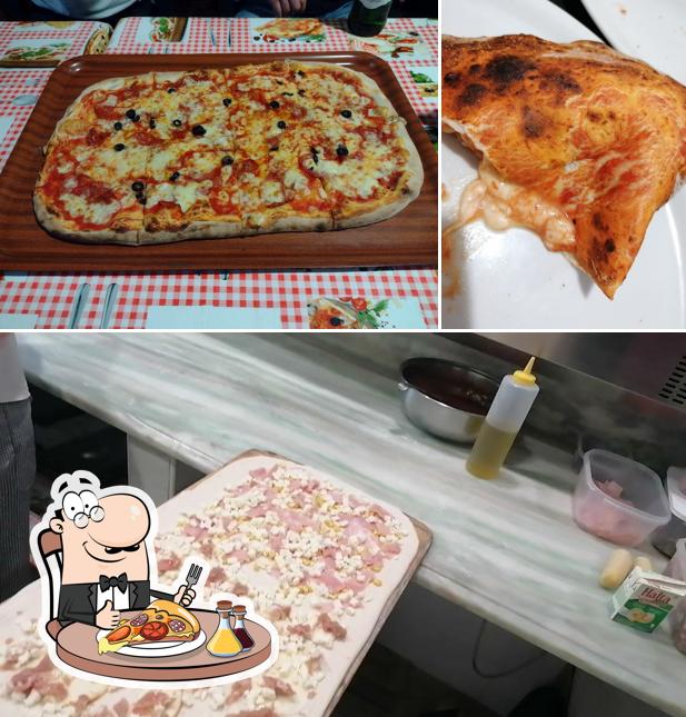 A Pizzeria Addù Fabbio, puoi prenderti una bella pizza