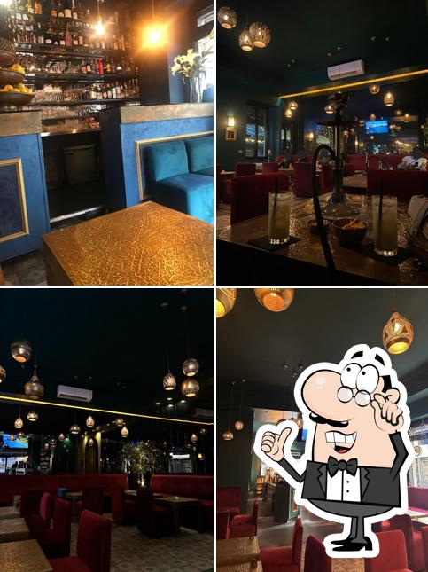 Siediti a un tavolo di Sahara shisha bar