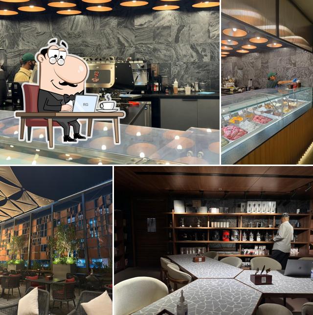 Take a seat at one of the tables at Roast CCX - Coffee & Culinary Xperience