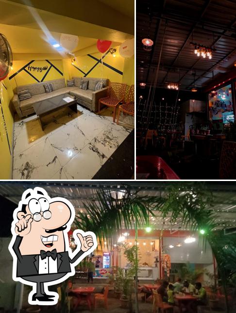Take a seat at one of the tables at MJ Cafe Hub