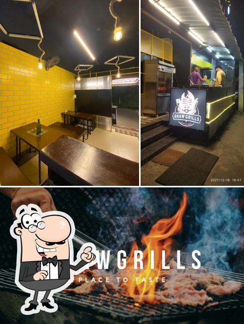 This is the picture displaying interior and food at SHAW GRILLS