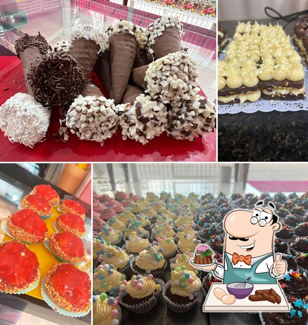 Gislaine Kit Festa serve uma variedade de pratos doces