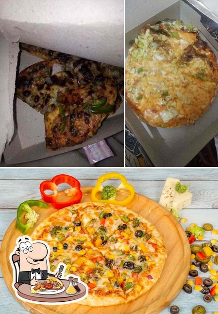 Try out pizza at Hari Om Fast Food