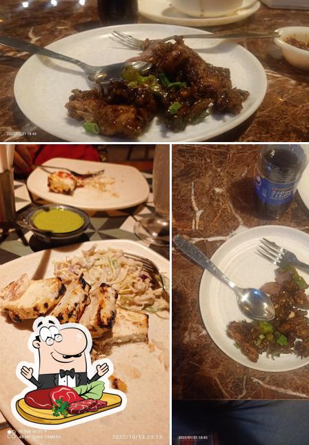 Order meat dishes at The Lake View Dine & Restaurant