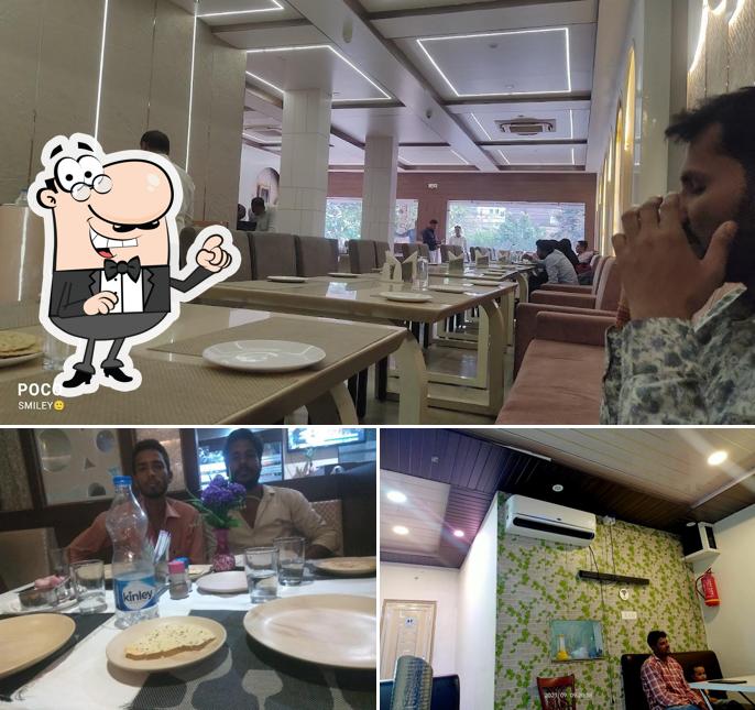 The picture of Milan Restaurant’s interior and dining table