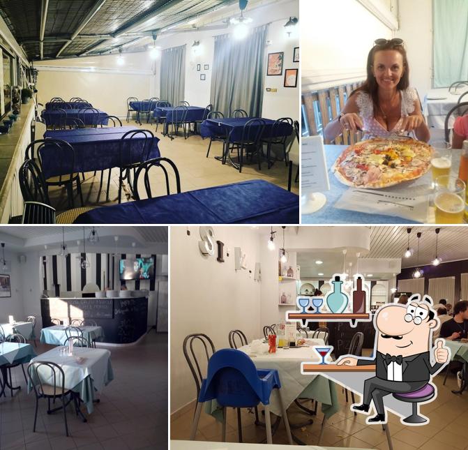 Dai un'occhiata agli interni di Quisipizza