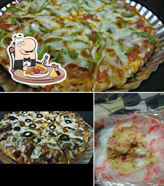 Get pizza at Hot n Spicy