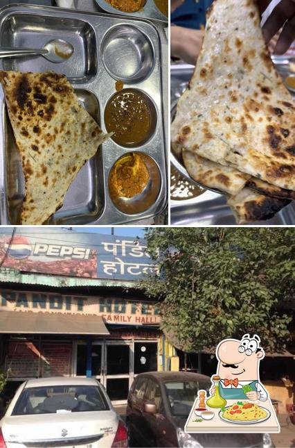 The photo of Pandit Jagannath Hotel’s food and exterior