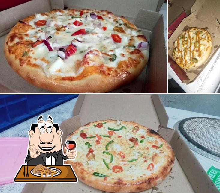 Get pizza at Singh Pizza