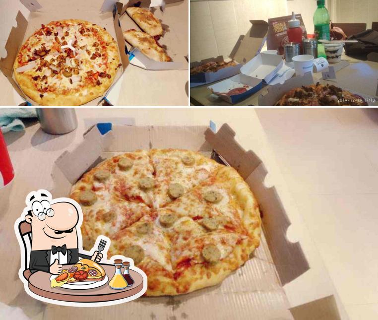At Domino's Pizza Beledanga, Kolkata, you can enjoy pizza