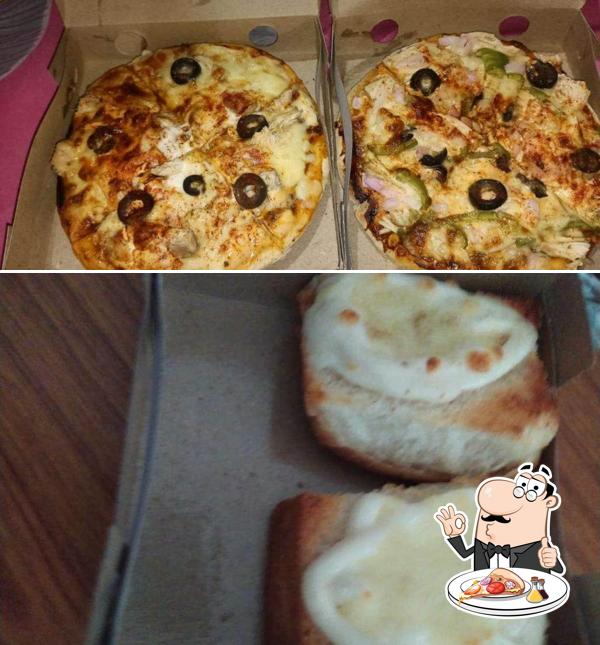 At Pizza & Burger House, you can try pizza