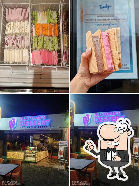 Check out the photo depicting interior and food at Rustam Desserts