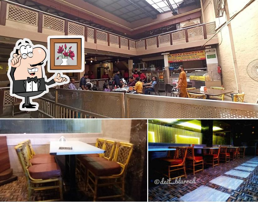 Take a seat at one of the tables at Agatya pure veg