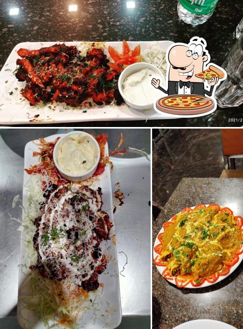 Order pizza at Hotel Mustaq