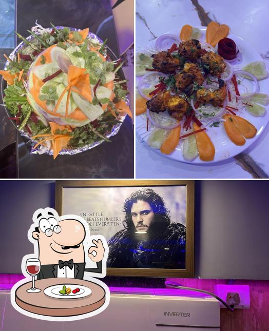 Among various things one can find food and interior at MUTTON MELA Cafe and Resturent