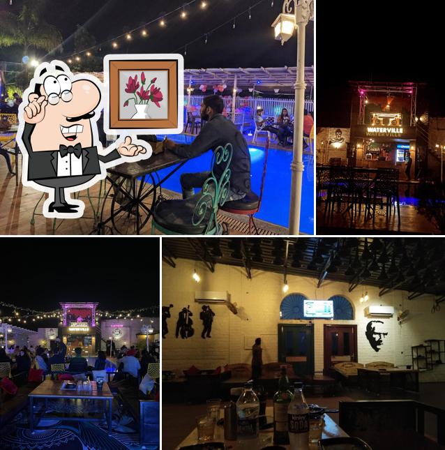 Take a seat at one of the tables at WaterVille Pooldeck & Lounge