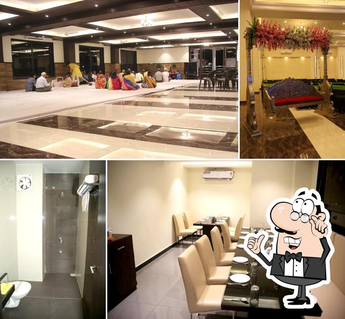Take a seat at one of the tables at Hotel Lavanya Palace - Ratlam