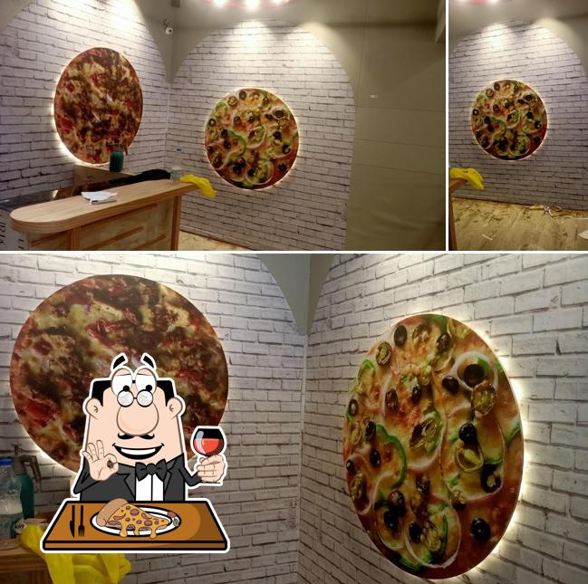 Try out pizza at Al-baik, Sona lodge, Near One India Family Mart, Azad Nagar, Siddharth Nagar Uttar Pradesh 272207