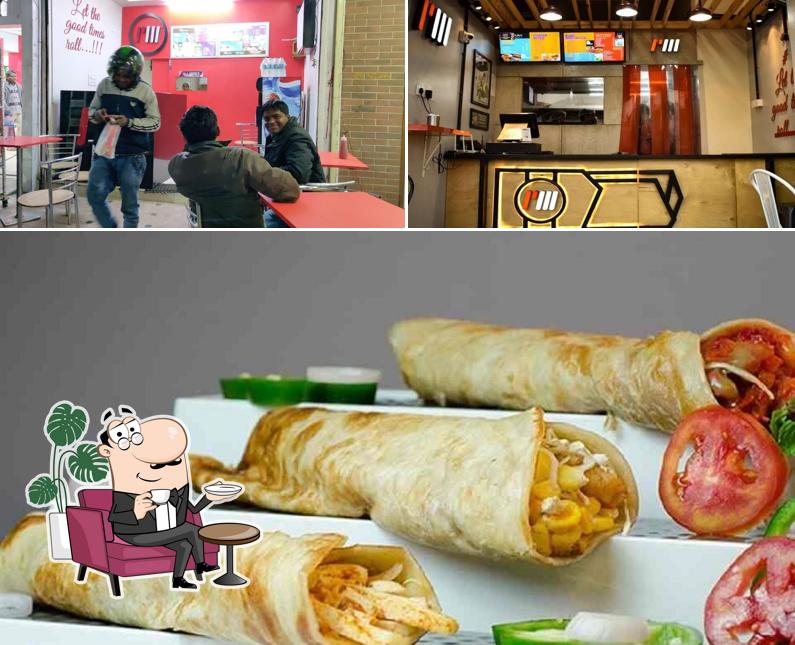 The picture of interior and food at Rolls Mania