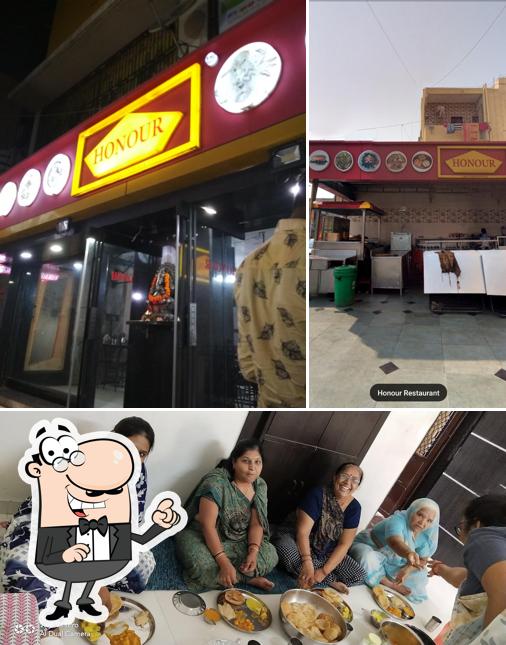 Among different things one can find exterior and food at Honour Restaurant