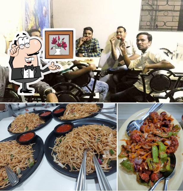 Take a seat at one of the tables at K V Chinese Corner