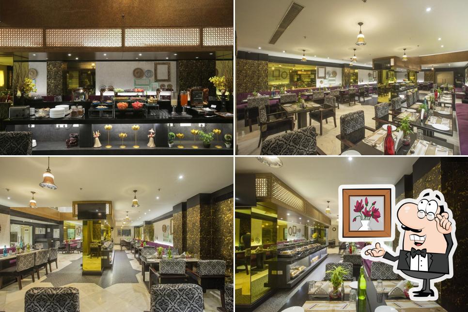 Take a seat at one of the tables at Dalchini