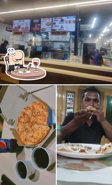 Among various things one can find food and interior at Domino's Pizza