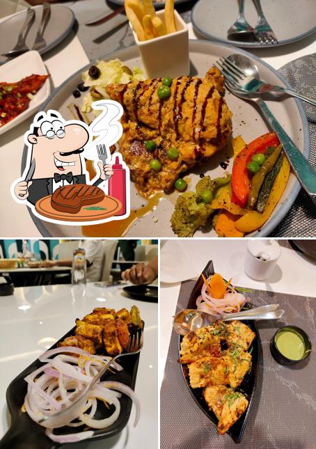 Order meat dishes at The Fisherman's Kitchen Puri