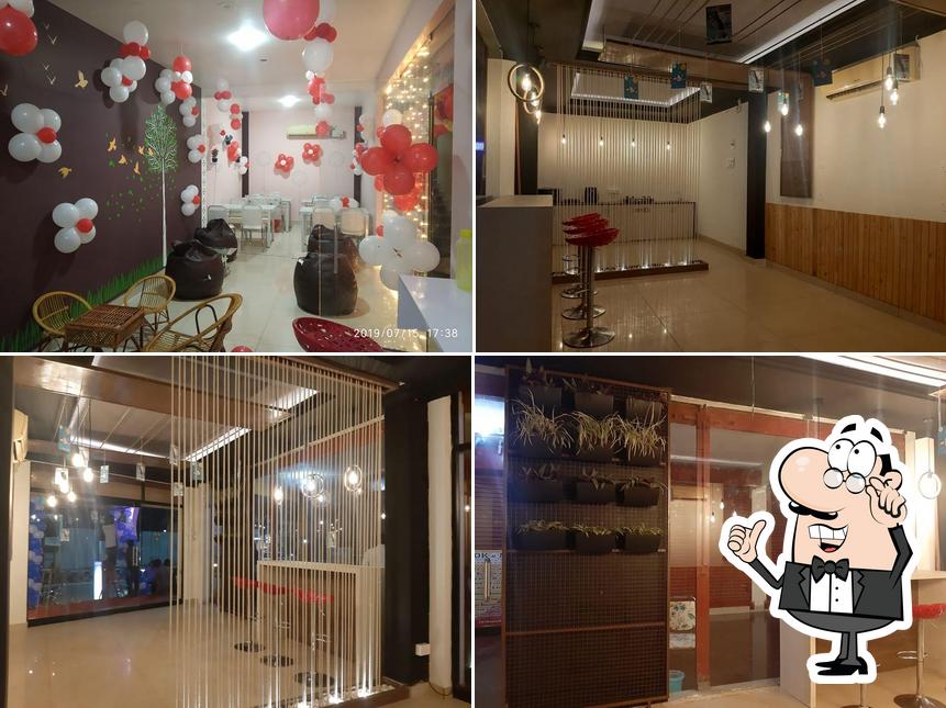 The interior of Tanish Bubble Cafe ( Pizza, Sandwich, Burger, Ice cream, Milkshakes, Fresh Juice )