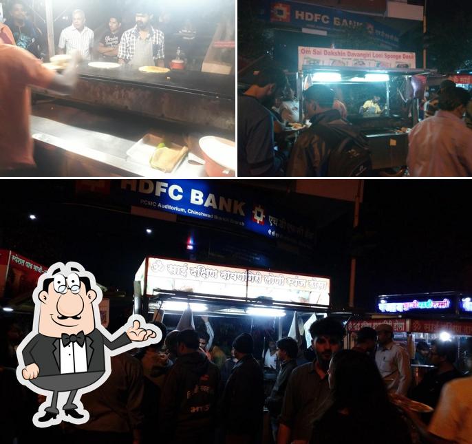 The photo of Om Sai Dakshin Davangiri’s interior and bar counter