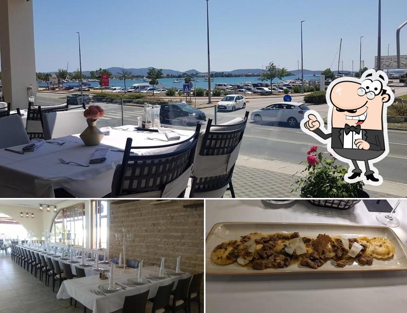 La immagine di interni e cibo da Francesco Restaurant