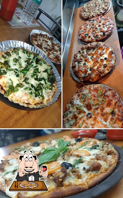 Try out pizza at 90 Feet Chinesepizza thakurli