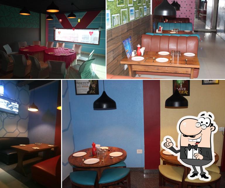 Take a seat at one of the tables at Athens Grill,Amritsar
