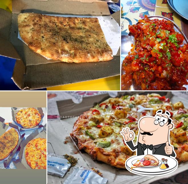 Pick pizza at Domino's Pizza Ranjit Avenue, Amritsar