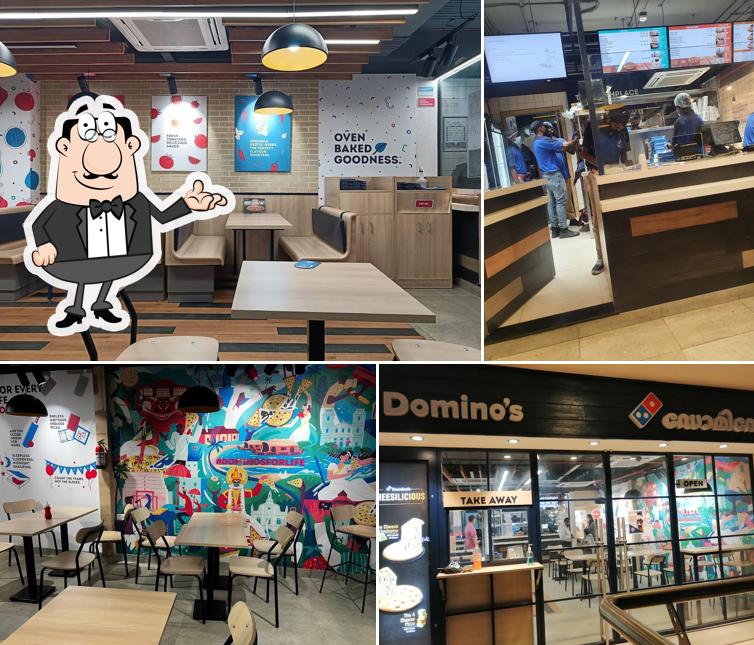 Take a seat at one of the tables at Domino's Pizza