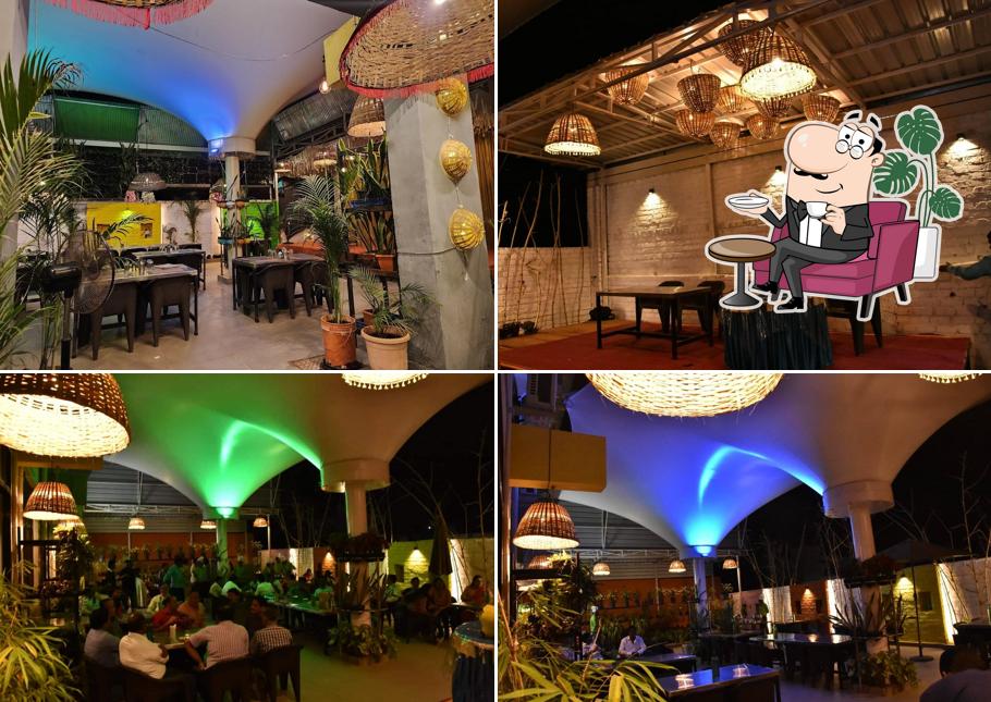 Take a seat at one of the tables at Hotel Tarai Pure Veg