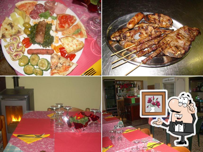 Questa è la foto che raffigura la interni e cibo di Pizzeria Delizia