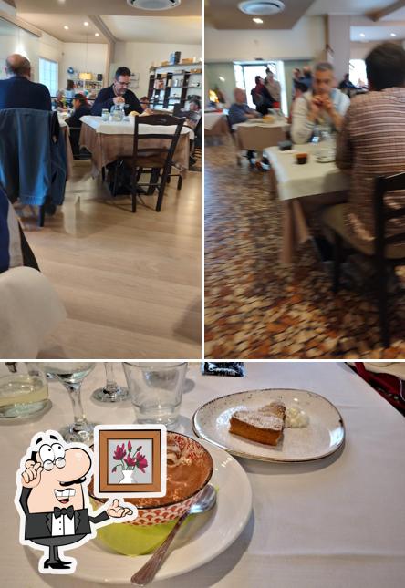 Dai un’occhiata alla foto che presenta la interni e bevanda di Osteria La Quiete di Seminara Maria Domenica