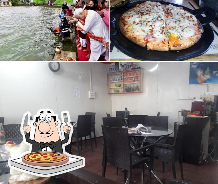 Get pizza at Cafe 9
