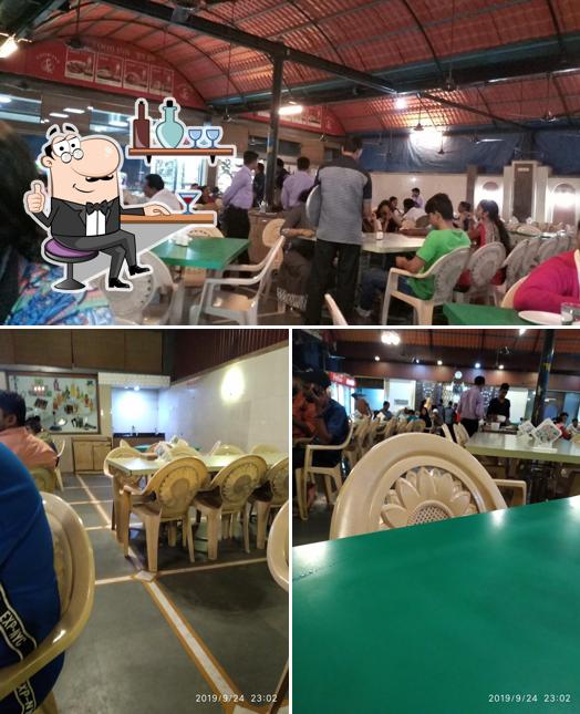 Take a seat at one of the tables at Food INN