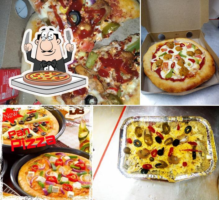 Order pizza at Delicious Bite continental restaurant Raiganj