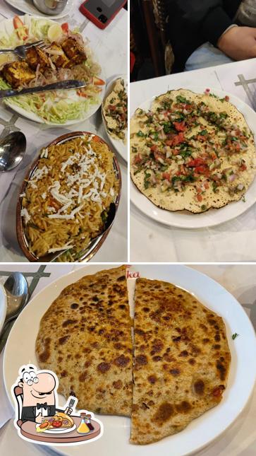 Pick pizza at Woods Restaurant Alka Hotel