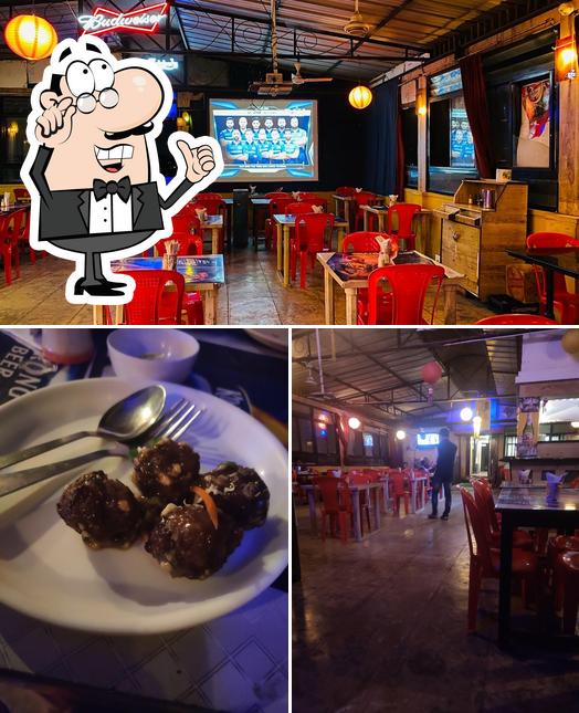 This is the picture depicting interior and meat at Patang Bar And Restaurant