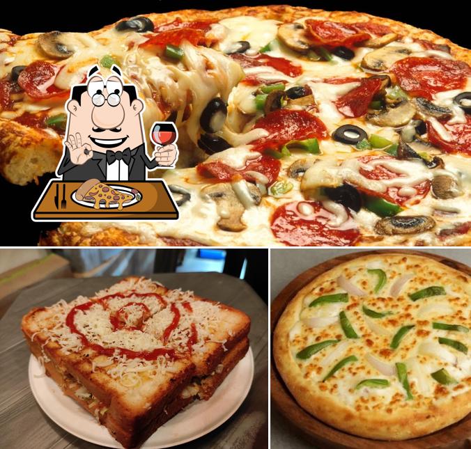 Try out pizza at Amit's Cozzy Cafe